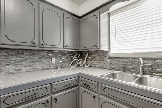 601 Woodland Way, Oklahoma City, OK 73127 - kitchen featuring gray cabinets, tasteful backsplash, and light countertops
