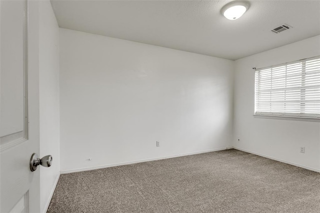 601 Woodland Way, Oklahoma City, OK 73127 - unfurnished room with carpet flooring