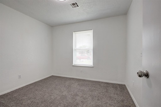 1633 SE 52nd St, Oklahoma City, OK 73129 - carpeted spare room with a textured ceiling and baseboards