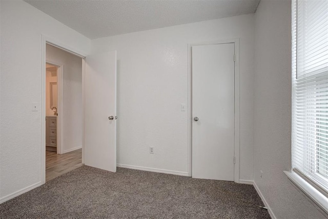 1633 SE 52nd St, Oklahoma City, OK 73129 - unfurnished bedroom with carpet flooring and baseboards