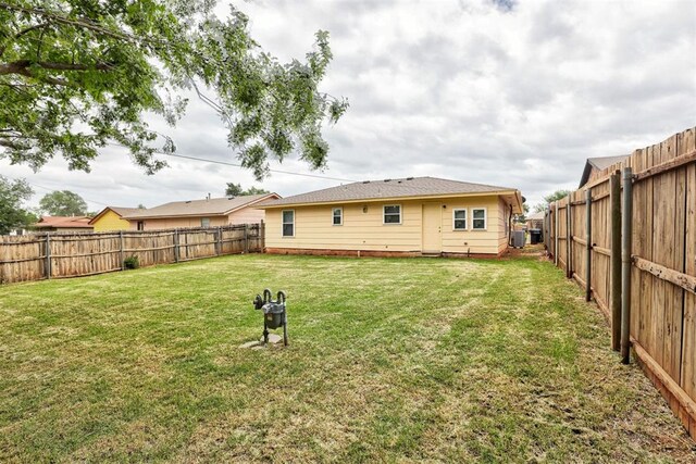 1633 SE 52nd St, Oklahoma City, OK 73129 - rear view of house featuring cooling unit