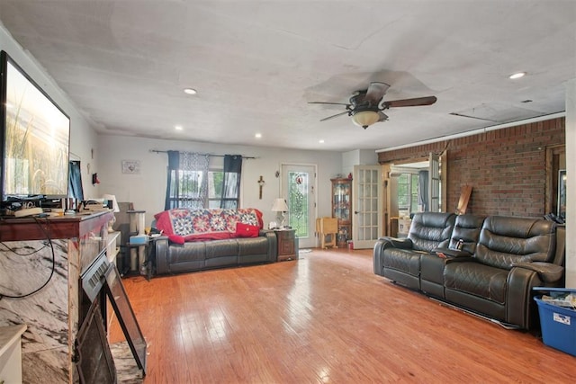 1001 N Pine St, Midwest City, OK 73130 - living room featuring light wood-type flooring, ceiling fan, and recessed lighting
