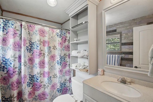 1001 N Pine St, Midwest City, OK 73130 - full bath with vanity, toilet, and a shower with shower curtain