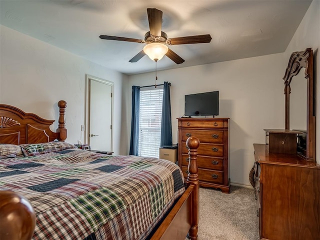 2500 Huntwick Dr, Edmond, OK 73034 - bedroom with light colored carpet and a ceiling fan