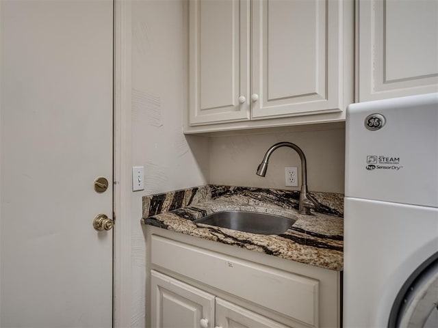 2500 Huntwick Dr, Edmond, OK 73034 - laundry room with cabinet space