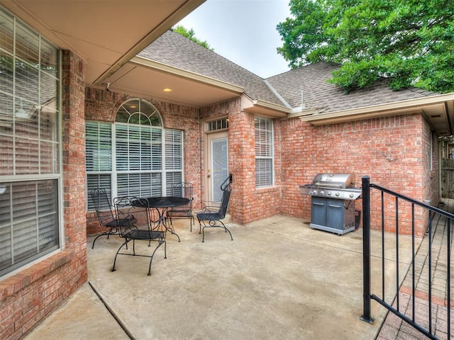 2500 Huntwick Dr, Edmond, OK 73034 - view of patio featuring area for grilling and outdoor dining area