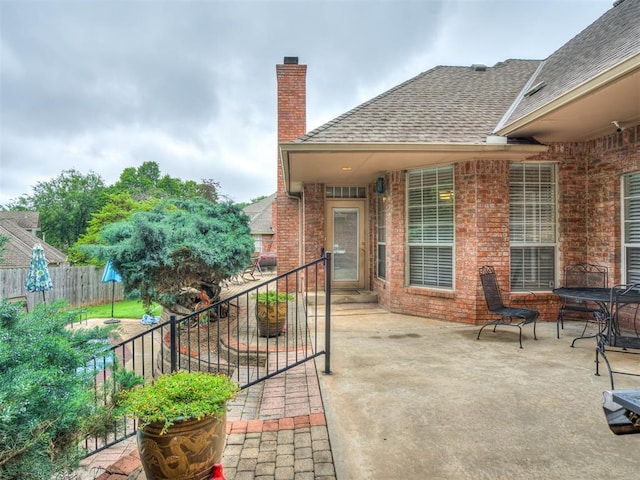 2500 Huntwick Dr, Edmond, OK 73034 - view of patio / terrace with a balcony