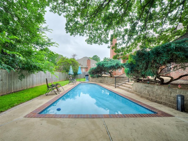 2500 Huntwick Dr, Edmond, OK 73034 - view of swimming pool with a fenced backyard and a patio area