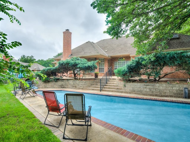 2500 Huntwick Dr, Edmond, OK 73034 - view of swimming pool featuring a patio