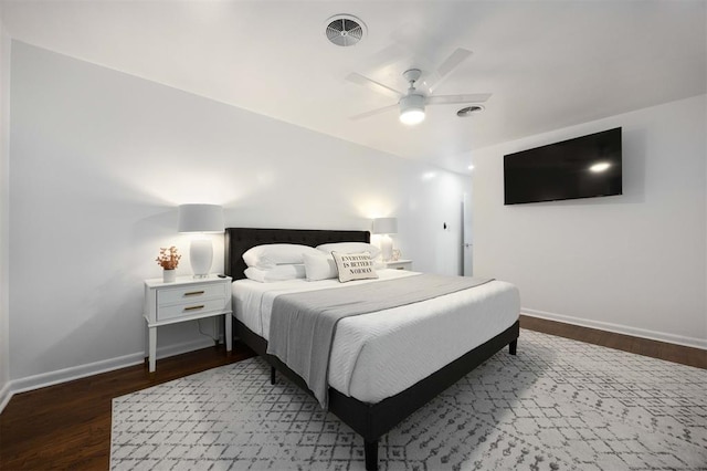 1224 W Brooks St, Norman, OK 73069 - bedroom with baseboards, wood finished floors, and ceiling fan