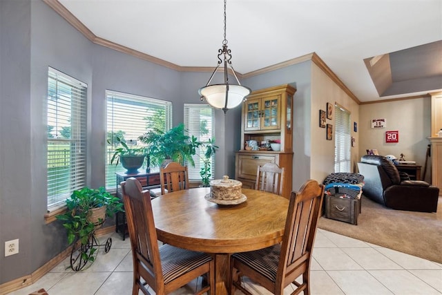 11700 Hackney Ln, Yukon, OK 73099 - dining area featuring light tile patterned flooring, ornamental molding, and light colored carpet