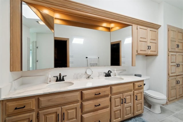 11700 Hackney Ln, Yukon, OK 73099 - full bath with double vanity, toilet, and tile patterned flooring