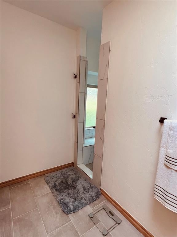 11700 Hackney Ln, Yukon, OK 73099 - bathroom with baseboards and tile patterned floors