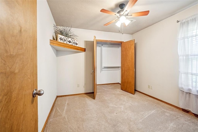 1908 Riviera Dr, Tuttle, OK 73089 - unfurnished bedroom featuring carpet floors, baseboards, and a ceiling fan
