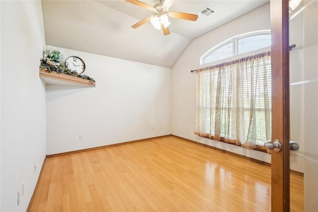 1908 Riviera Dr, Tuttle, OK 73089 - unfurnished room with lofted ceiling, ceiling fan, wood finished floors, and baseboards