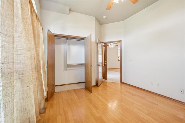 1908 Riviera Dr, Tuttle, OK 73089 - unfurnished bedroom featuring wood finished floors, a ceiling fan, baseboards, and a closet