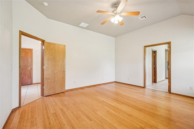 1908 Riviera Dr, Tuttle, OK 73089 - unfurnished room with a ceiling fan, light wood-style flooring, lofted ceiling, a smoke detector, and baseboards
