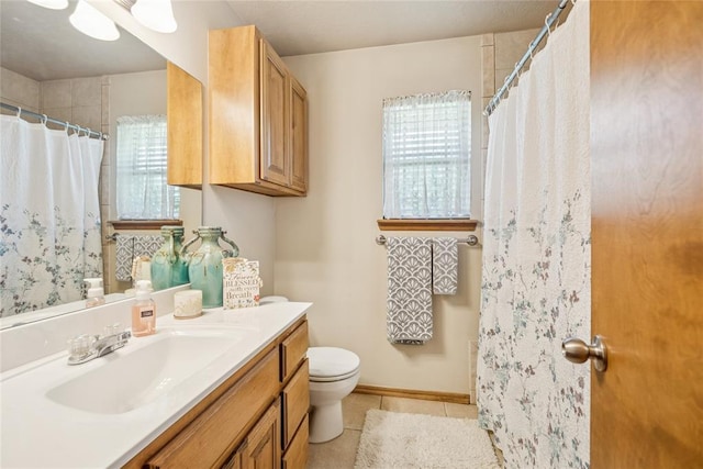 1908 Riviera Dr, Tuttle, OK 73089 - full bath featuring toilet, vanity, tile patterned flooring, and a shower with curtain