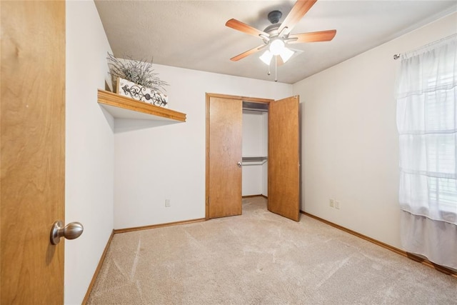1908 Riviera Dr, Tuttle, OK 73089 - unfurnished bedroom with carpet, baseboards, and a ceiling fan