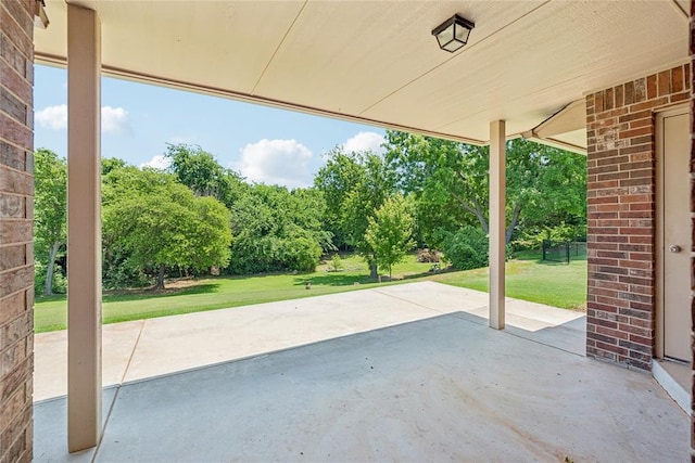 1908 Riviera Dr, Tuttle, OK 73089 - view of patio / terrace featuring view of wooded area