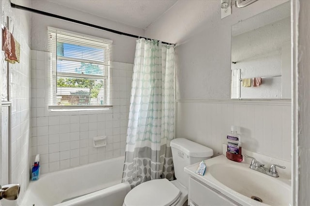 2119 Pearson Dr, Midwest City, OK 73110 - full bathroom with shower / tub combo, vanity, and wainscoting