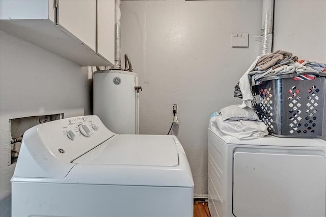 2119 Pearson Dr, Midwest City, OK 73110 - washroom featuring independent washer and dryer, gas water heater, and cabinet space