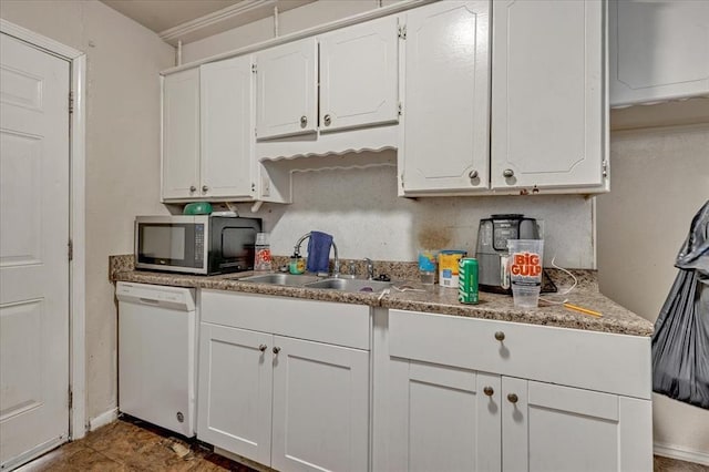 208 E Lockheed Dr, Midwest City, OK 73110 - kitchen featuring dishwasher, stainless steel microwave, and white cabinets