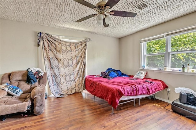 208 E Lockheed Dr, Midwest City, OK 73110 - bedroom featuring wood finished floors and a ceiling fan