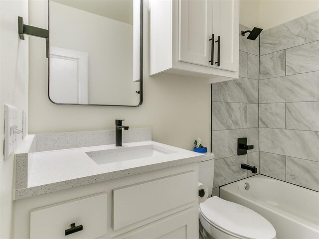 26603 Main St, Blanchard, OK 73010 - full bath with vanity, toilet, and shower / washtub combination
