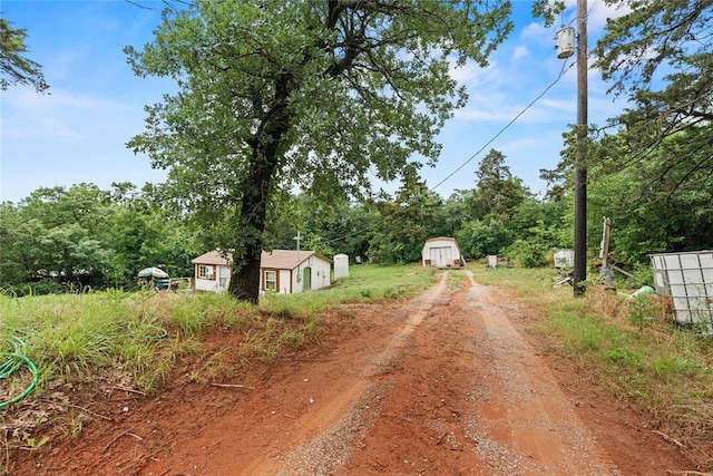 21380 E Fifth St, Hinton, OK 73047 - view of dirt / gravel driveway