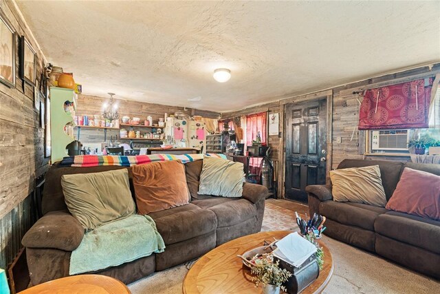 21380 E Fifth St, Hinton, OK 73047 - living area featuring wood walls and a textured ceiling