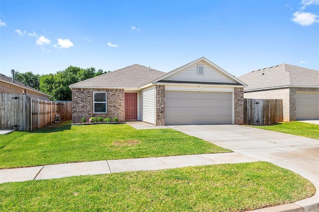 11604 NW 95th St, Yukon, OK 73099 - ranch-style home with brick siding, an attached garage, and concrete driveway