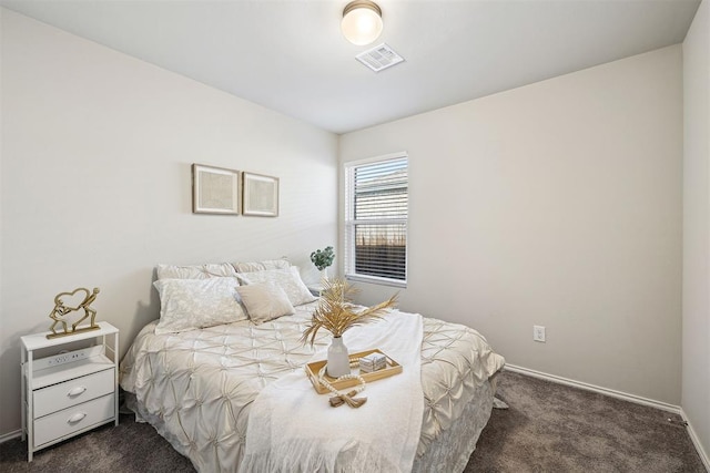 11604 NW 95th St, Yukon, OK 73099 - bedroom featuring dark colored carpet and baseboards