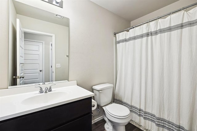 11604 NW 95th St, Yukon, OK 73099 - full bath featuring vanity and wood finished floors
