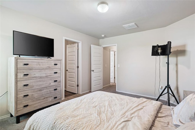 11604 NW 95th St, Yukon, OK 73099 - bedroom featuring dark colored carpet