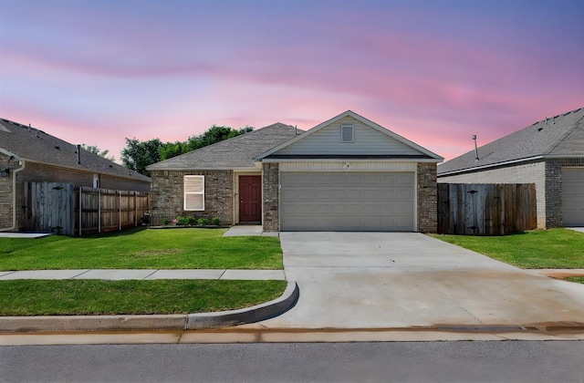 11604 NW 95th St, Yukon, OK 73099 - ranch-style home featuring brick siding, driveway, and an attached garage