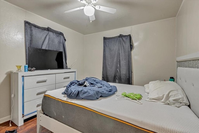 1500 Maple Dr, Midwest City, OK 73110 - bedroom featuring dark wood-style floors and a ceiling fan