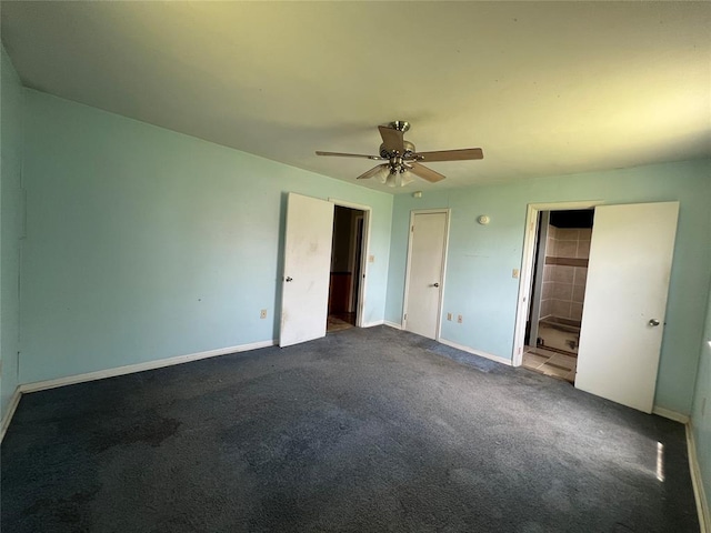1012 Box St, Altus, OK 73521 - unfurnished bedroom featuring carpet flooring, baseboards, and a ceiling fan