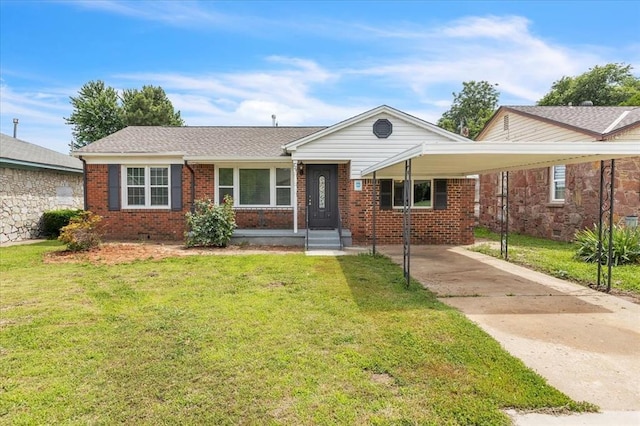 724 SW 48th St, Oklahoma City, OK 73109 - view of front of house with driveway, brick siding, and a front lawn