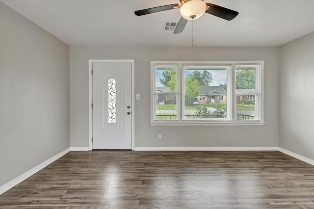 724 SW 48th St, Oklahoma City, OK 73109 - foyer featuring wood finished floors, baseboards, and a ceiling fan