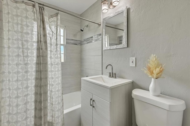 724 SW 48th St, Oklahoma City, OK 73109 - full bath with shower / bath combo with shower curtain, toilet, vanity, and a textured wall