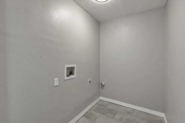 724 SW 48th St, Oklahoma City, OK 73109 - laundry area featuring washer hookup, baseboards, and hookup for an electric dryer