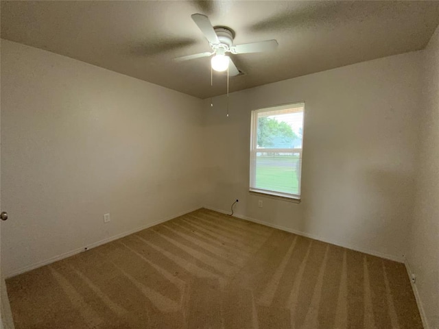 1817 NW 146th St, Edmond, OK 73013 - empty room with light colored carpet, a ceiling fan, and baseboards