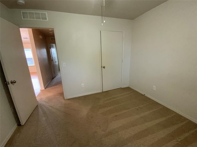 1817 NW 146th St, Edmond, OK 73013 - carpeted empty room with baseboards