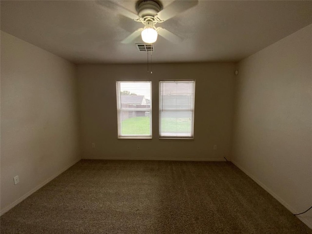 1817 NW 146th St, Edmond, OK 73013 - carpeted spare room featuring ceiling fan and baseboards
