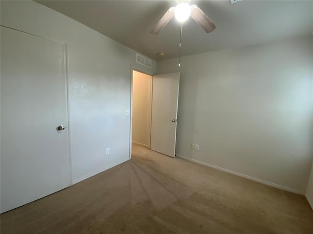 1817 NW 146th St, Edmond, OK 73013 - unfurnished bedroom with carpet flooring, baseboards, and a ceiling fan