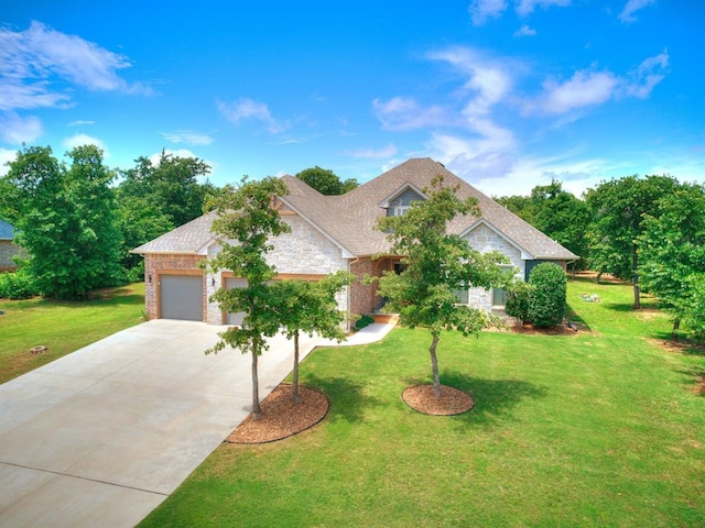 13001 Broken Arrow, Arcadia, OK 73007 - view of front of house with brick siding, concrete driveway, a front lawn, and a garage
