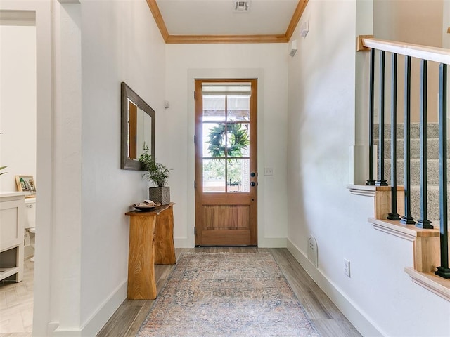 13001 Broken Arrow, Arcadia, OK 73007 - entryway featuring ornamental molding, wood finished floors, and baseboards