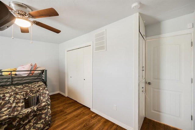 4120 SE 112th St, Moore, OK 73160 - bedroom featuring wood finished floors, baseboards, and a ceiling fan