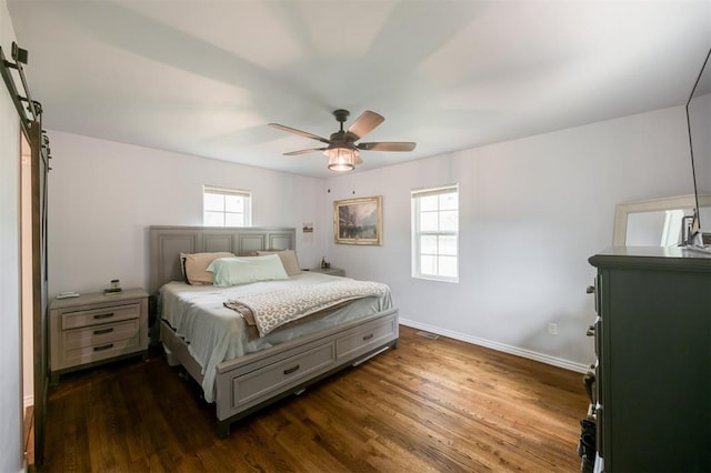 4120 SE 112th St, Moore, OK 73160 - bedroom featuring dark wood-style flooring, baseboards, and ceiling fan